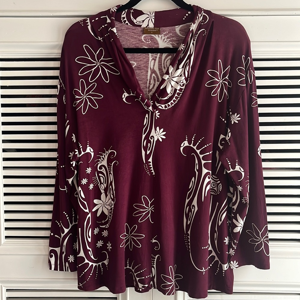 Wahine Toa pre owned woman’s top.
